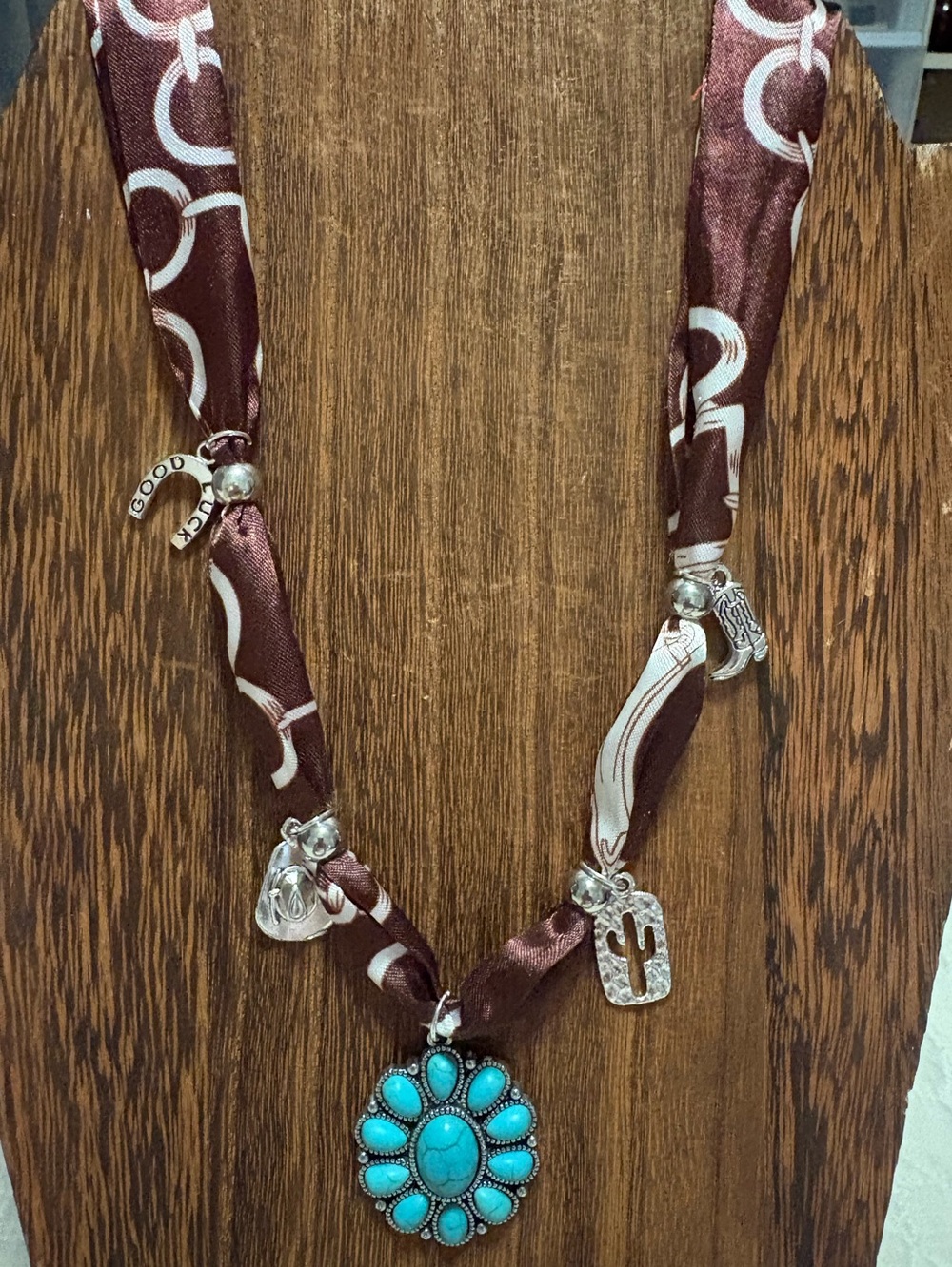 Turquoise Floral Pendant Necklace on Brown Twilly with charms